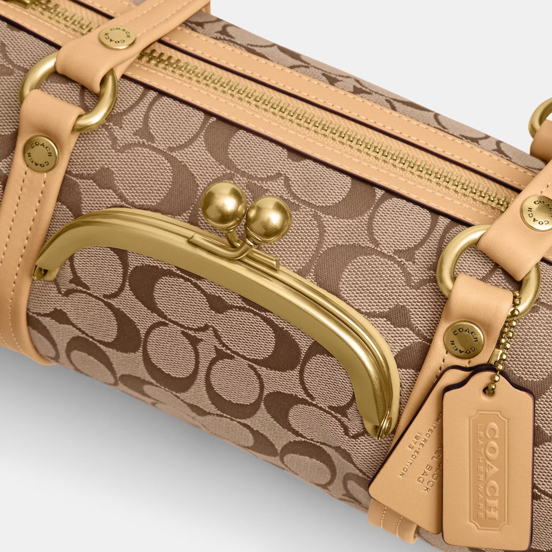 COACH CLASSIC SIGNATURE KISSLOCK BARREL 28 HANDBAG